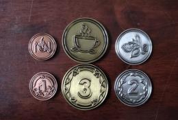 Kovové mince (součástí deluxe verze)