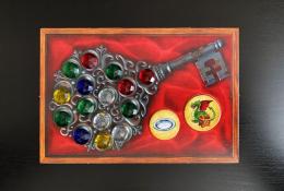 Kouzelný klíč naplněný drahokamy, předmětem a truhlou s pokladem pro draka