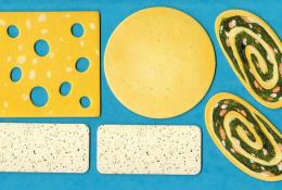 Různé druhy plátkového sýra, bylinkový sýr, sýrová roláda (kartonové komponenty)