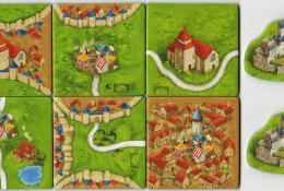 Výběr z celkem 12 kartiček krajiny s novější grafikou + žetony hradů