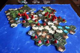 Taluva (sólo variant -iná ukončená hra- vznikli 3 osady a malebný ostrov,bez straty jedinej budovy)