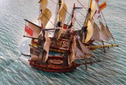 2 pirátske lode rabujúce anglického kupca.